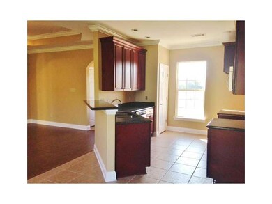 Kitchen. Kitchen is equipped with gas stove, tile 