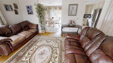 Living room view into dining room