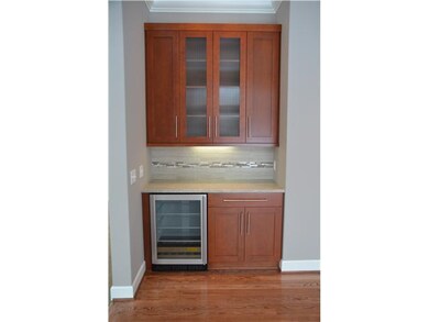 Kitchen. Built-in butler s pantry with beverage ce