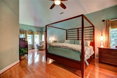 Master bedroom has vaulted ceilings and beautiful