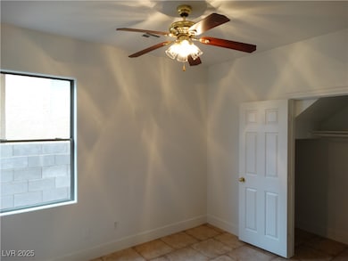 Unfurnished bedroom featuring baseboards, a ceilin