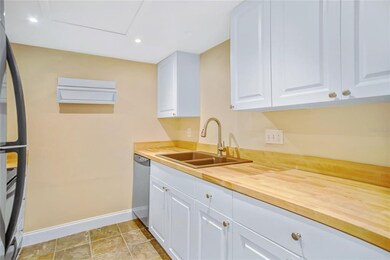 New, all wood cabinets and butcher block counter t