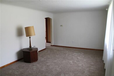 Walk in the front door to the living room.