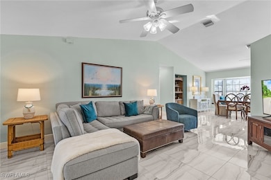 Living area featuring visible vents, marble finish