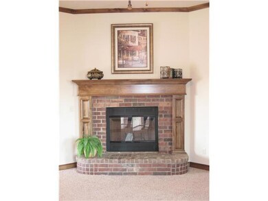 Living Room. Beautiful fireplace is the focal poin