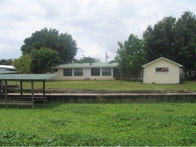 Back view with boat house
