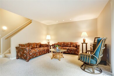 Family Room with Carpet, Recessed Lighting and Exi