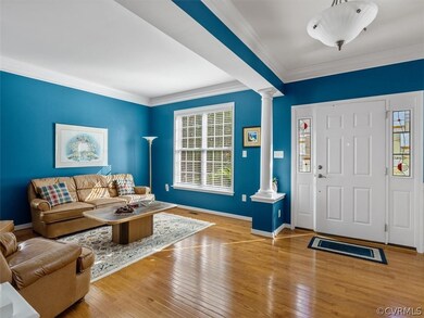 new stained glass, hardwoods, open floor plan to family room and formal dining room