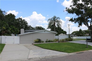 West side of house. Double driveways provide plent