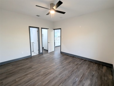 Primary Suite - located downstairs with walk-in cl