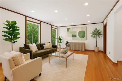 Living room featuring light wood finished floors,