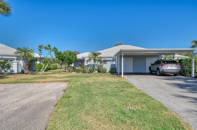 convenient parking pad and one covered spot in carport