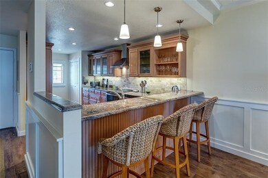 Kitchen opens to dining room and living room.