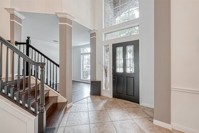 Front door, study room, staircase viewing from dining room