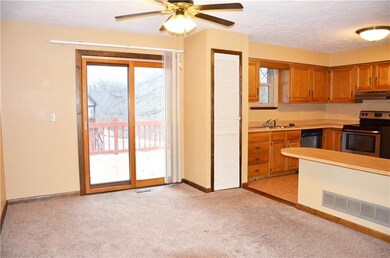 Dining room with ceiling fan opens to the kitchen