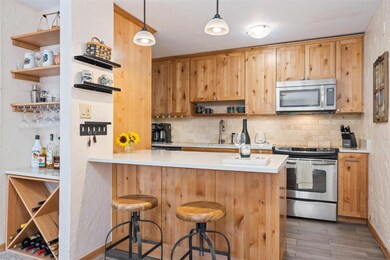 Kitchen featuring stainless steel appliances and b