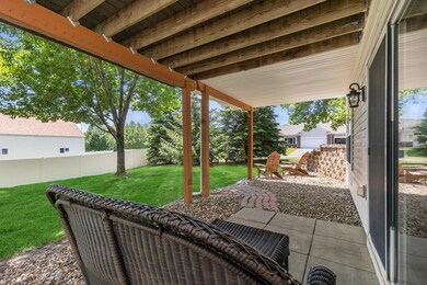 Walkout lower level leads to a cozy patio and great sitting area in the quiet backyard.