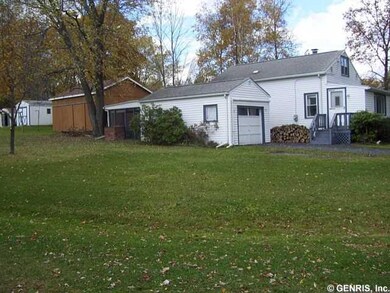 Exterior Front. Side view of home. Notice the scre