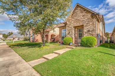 View of front property featuring central AC and a 