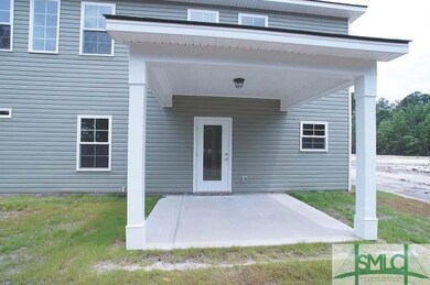 10' x 12' covered back patio. Photo of front of ho