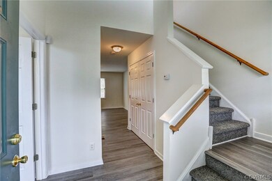 Side staircase to the right of the entrance.