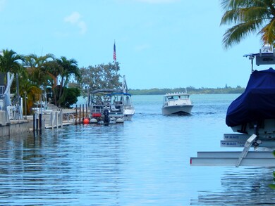Boat coming  up canal
