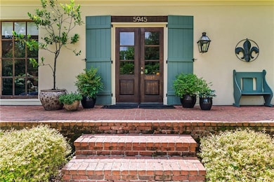 Doorway to property with french doors and stucco s