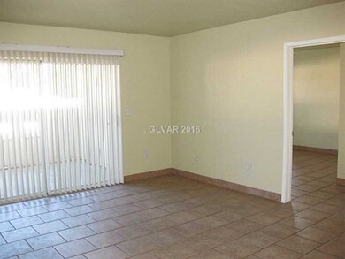 Property Photo. Living room viewed from hallway.