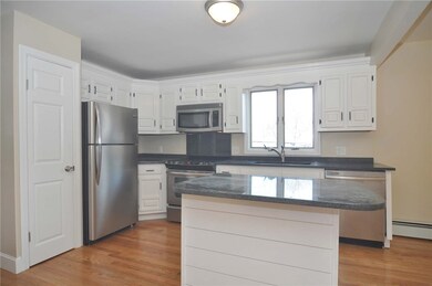 Kitchen with center island for additional sitting