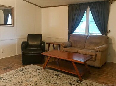 Open living area with new flooring.