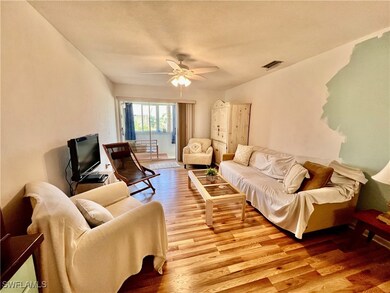 Living room with wood finished floors.
