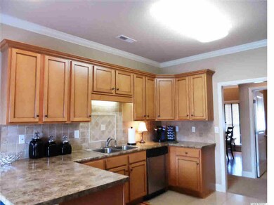 Kitchen with Stainless Steel appliances.
