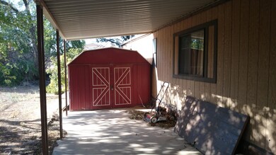 Covered patio and shed