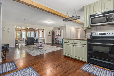 Open floorplan, hardwood floors on main level.
