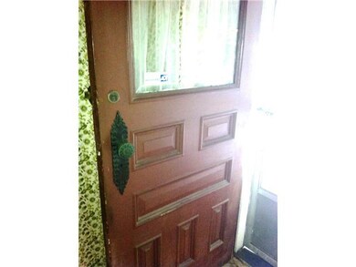 Exterior Front The handle on this lower front door