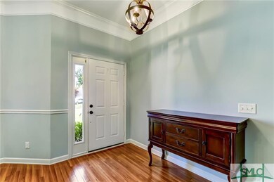 Upon entering the home the foyer is spacious with 