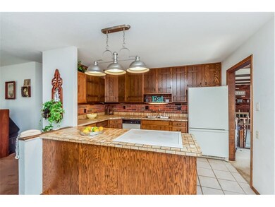 Remodeled kitchen with flat cook surface and break