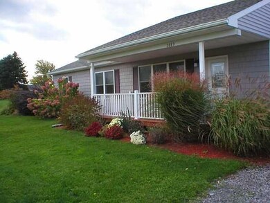 Exterior Front Covered Front Porch Has Wood Deck W
