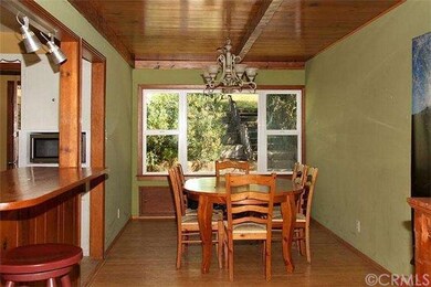 Dining room with views to the rear yard and patio 