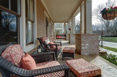 Relax here with company on your beautifully slated front porch.