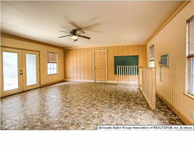 The tremendous room at the back of the home has ma