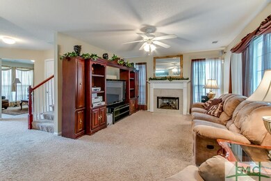 Continue through foyer past steps into Family Room
