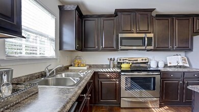 Similar home, same floor plan. Under construction. Options and colors may vary. Home decor, decorative paint and furnishings are not included. All pictures are of a decorated model and are only being used to demonstrate use of space with the plan and are not in actual home.