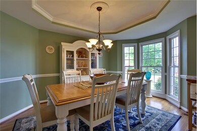 Dinner guest will enjoy the elegant Formal Dining Room with trey ceiling.