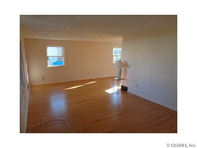 Exterior Front. Located on a mature tree lined str