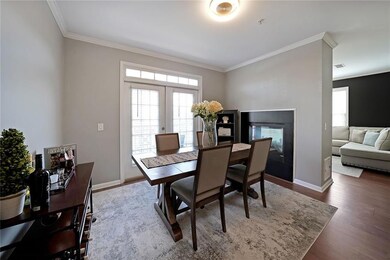 Dining room featuring crown molding, wood finished
