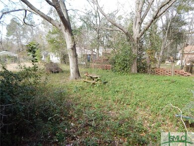 Back yard space for storage, playset, grills and m