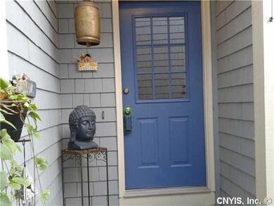 Exterior Front. pretty front door entryway. enclosed courtyard.