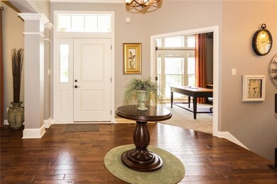 Bright and open foyer welcomes guests to your home.