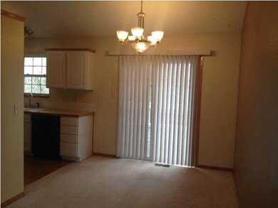 Dining area has sliding door out to deck.